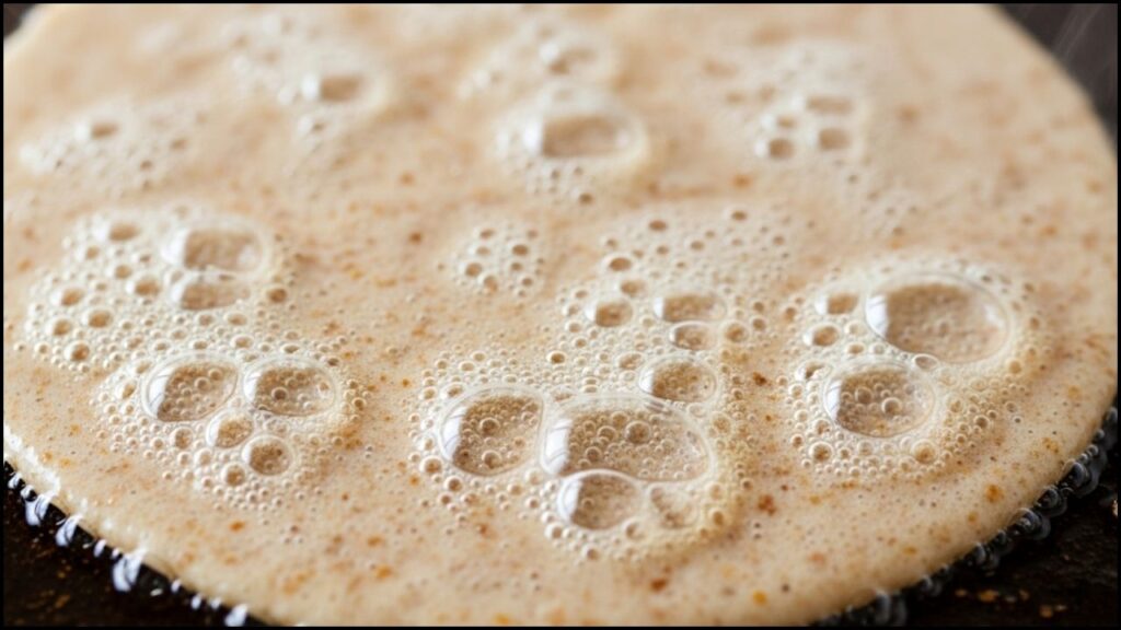 pancake batter on pan